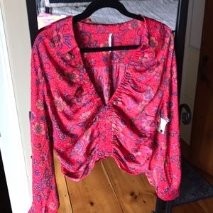 FreePeople Satin pullover blouse. Brand new with tags never worn.